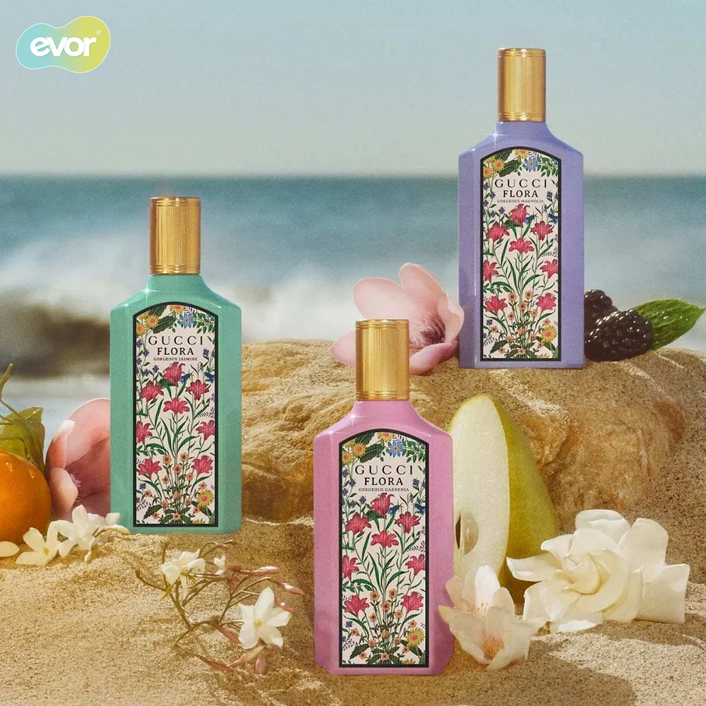Bottles of perfume on a beach